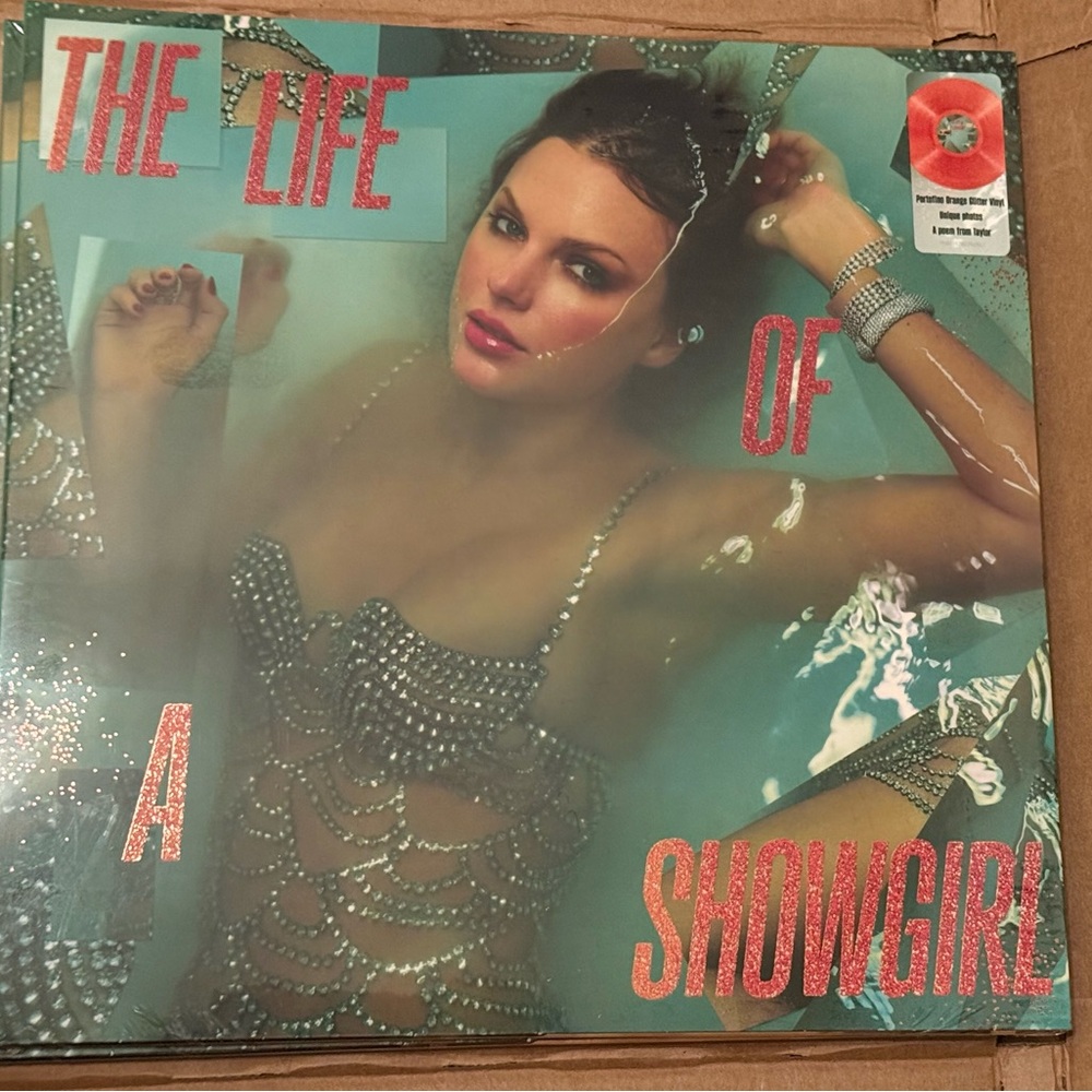 THE LIFE OF A SHOWGIRL: SWEAT AND VANILLA PERFUME PORTOFINO ORANGE GLITTER VINYL